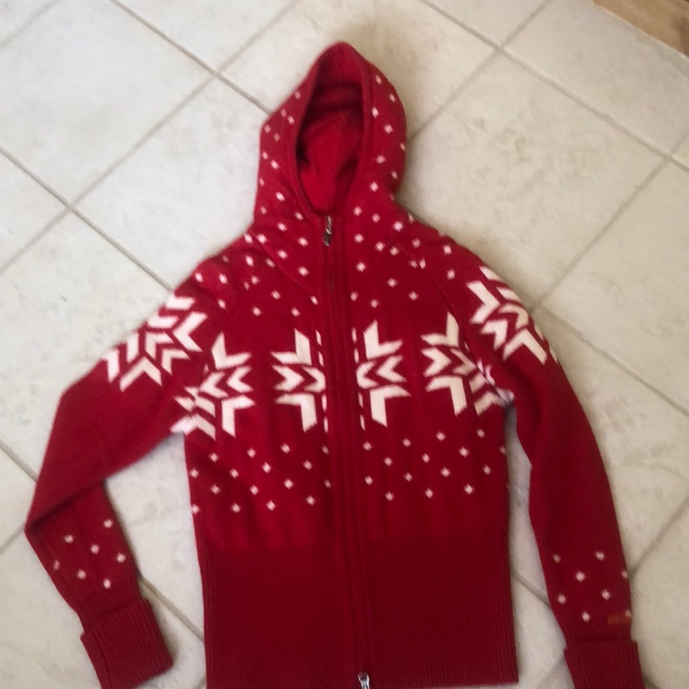 Kjus red lambs wool sweater.
